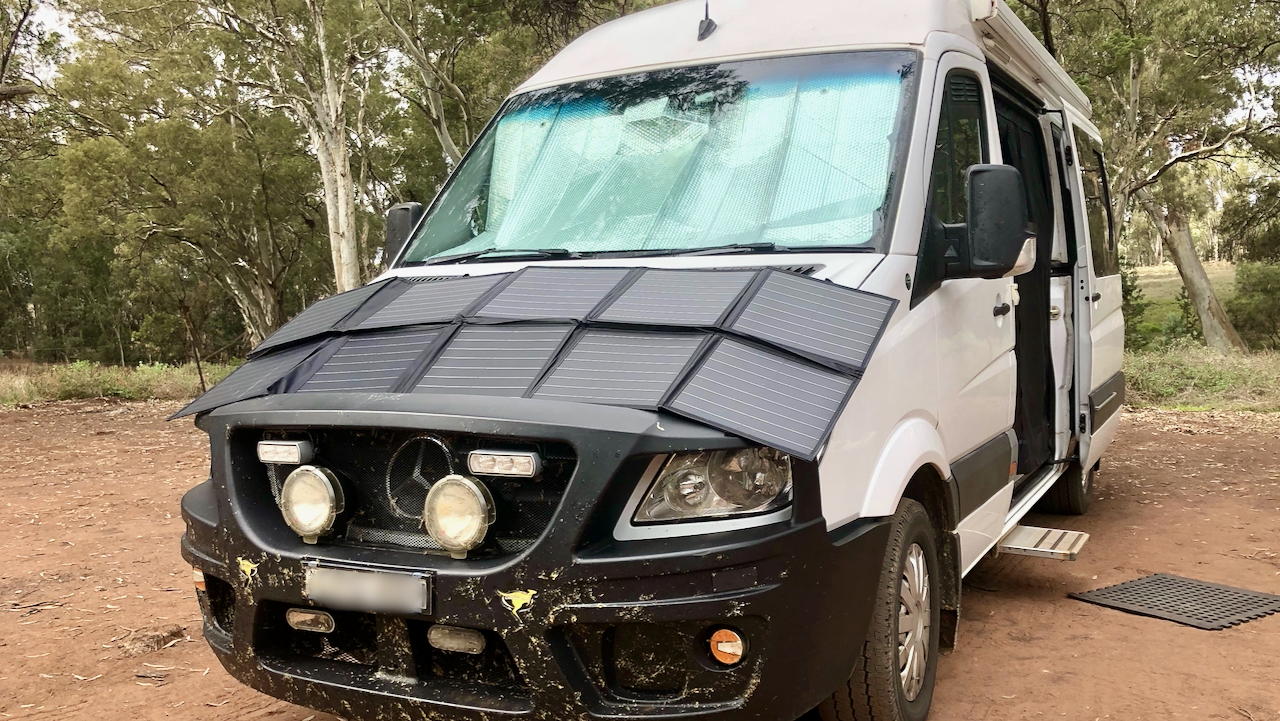 Blanket on hood of van